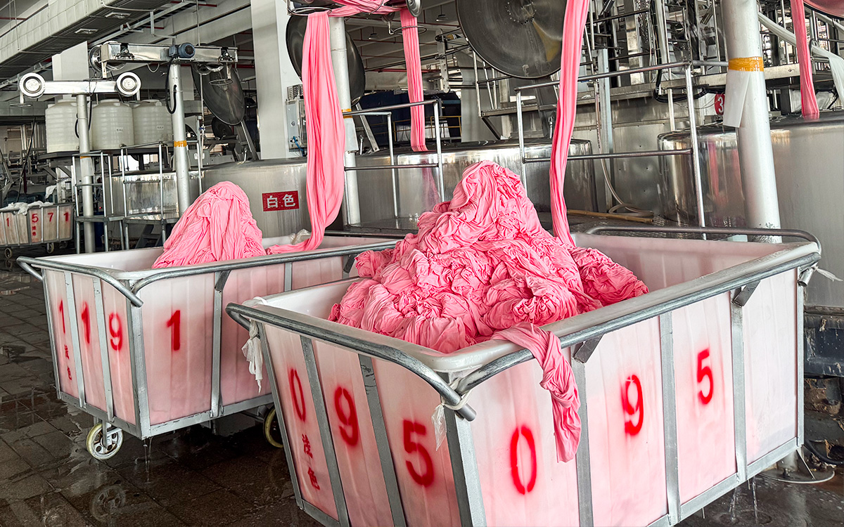 Close-up of textile machinery used for precision fabric weaving and stable production output