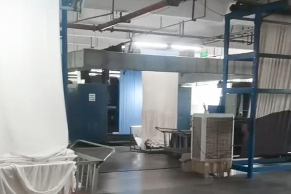 Fabric production process showing intelligent manufacturing and quality-controlled textile operations